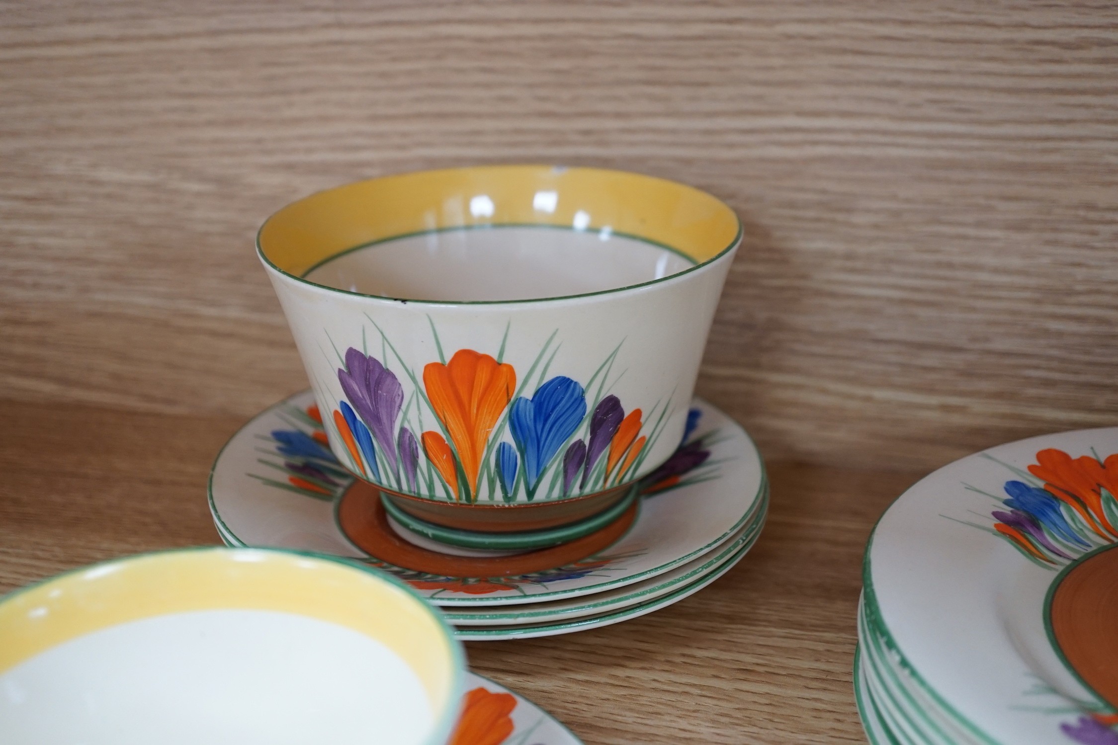 A Clarice Cliff seventeen piece Autumn Crocus part teaset, including a preserve jar and cover